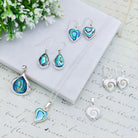 Hepburn and Hughes Shiva Eye Earrings | Mother of Pearl on Reverse | Heart Shaped | Sterling Silver