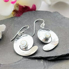 Hepburn and Hughes Shiva Eye Shell Earrings | Hammered Swirl | Sterling Silver