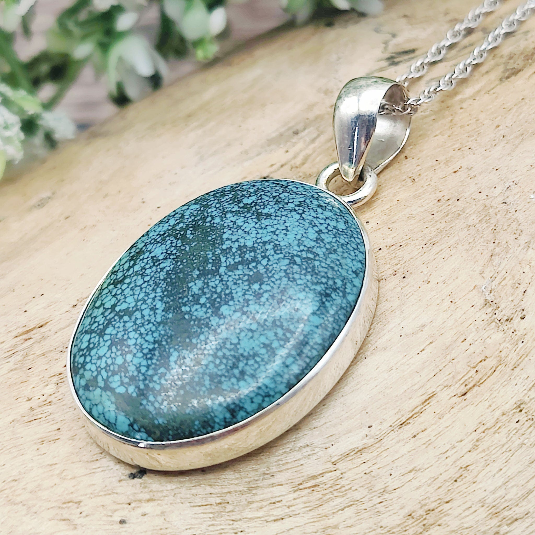 Offers Turquoise and pyrite necklace, sterling silver jewelry, blue topaz pendants