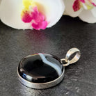 Hepburn and Hughes Banded Black Onyx Pendant | Circle | Sterling Silver