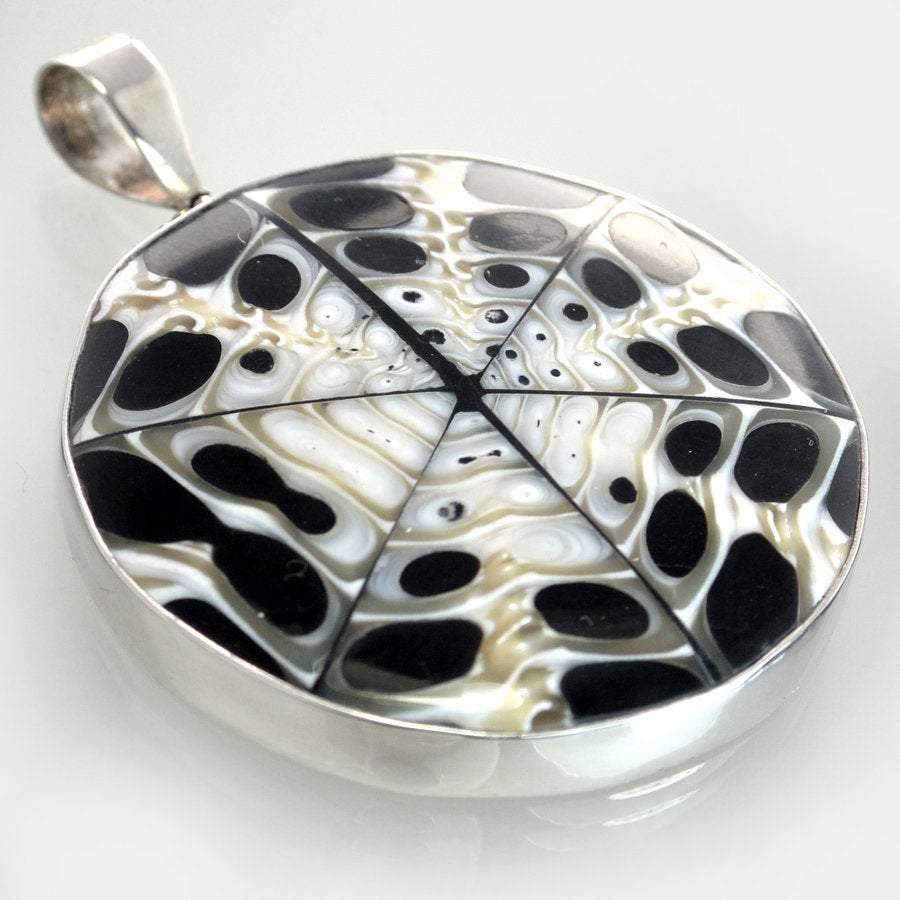 Hepburn and Hughes Seashell Pendant,  Black Medium Circle Troca in Sterling Silver